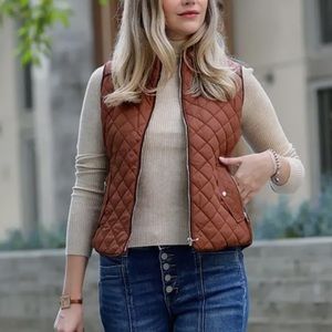 Women Camel Puffer Quilted Vest. Warm weather essential.